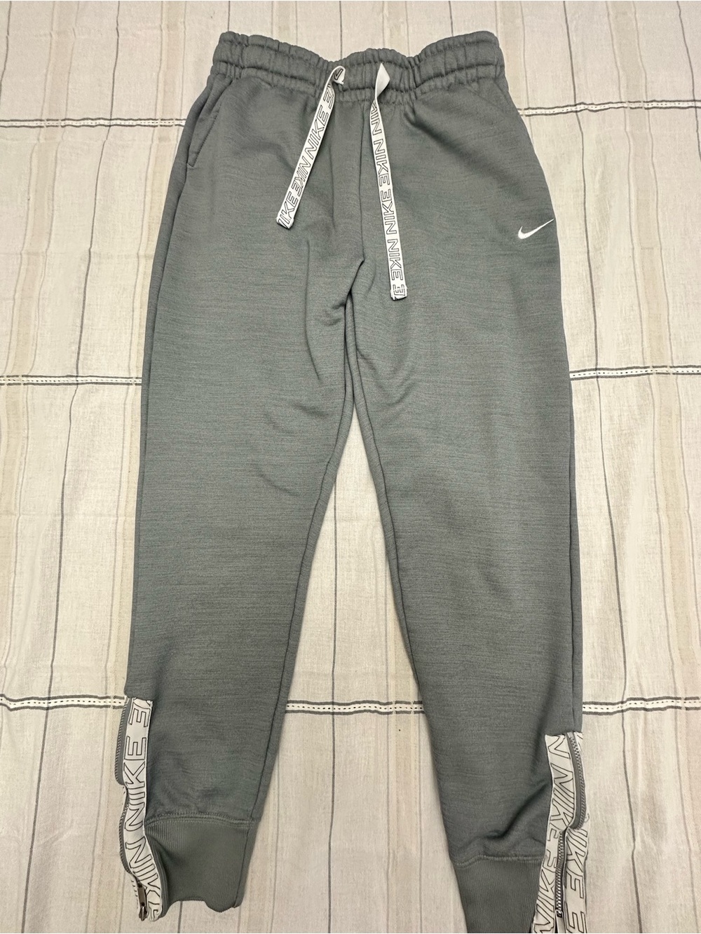 Nike Gray Mens Track Joggers with White Logo and Drawstrings